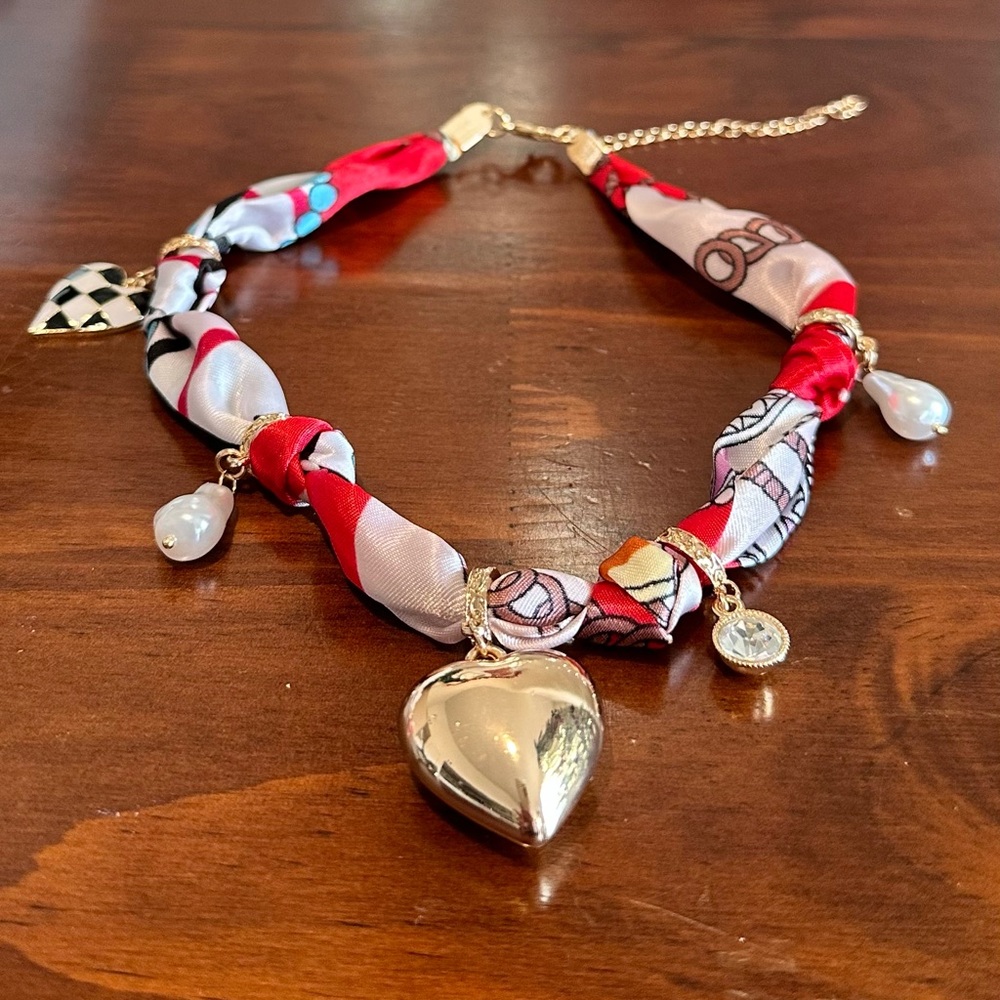 Elegant Gold and Red Heart Pendant Necklace